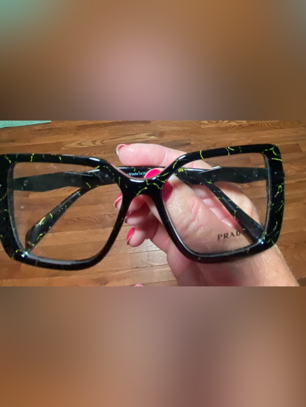 Prada PR 03ZV in the  "Black/Yellow Marble" colorway New without Tags  Frames